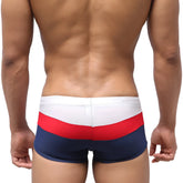 Men’s metroMalewear lycos swim trunks with bold red white and navy blue horizontal stripes for casual beachwear
