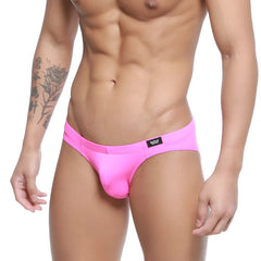 MetroMaleWear magenta bikini briefs in bright pink with sleek form-fitting design and black logo tag on waistband