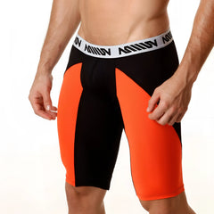 Black and orange mesh athletic shorts with white waistband featuring million branding metro malewear 15 inch long short