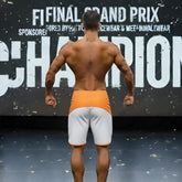 Orange and white athletic board shorts with contrasting orange waistband from metromalewear metro musclewear