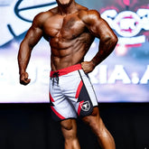 White and red MetroMuscleWear IFBB Pro men’s athletic shorts with black accents and bull logo on the side