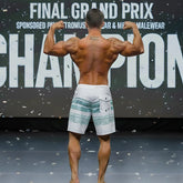 White board shorts with teal horizontal stripes and front pocket from MetroMaleWear MetroMuscleWear Innocent Physique