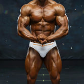 White metro muscle branded briefs with orange lettering and logo by MetroMaleWear MetroMuscleWear Avalanche 4700-02