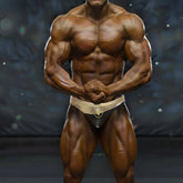 MetroMaleWear MetroMuscleWear Samuel competition suit gold black and gold bodybuilding briefs with metallic lion emblem