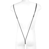 Black leather strap with adjustable metal clasps and a white cylindrical attachment from MetroMaleWear Miami bodysuit black 0008-20