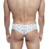 White briefs with bold black geometric and mustache pattern featuring arrow brand name metroMalewear micro cheek caballero 2027-03
