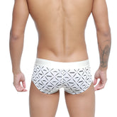 White briefs with black geometric mustache pattern and nassim branding from MetroMaleWear Micro Mini Boxer Caballero 7013-04