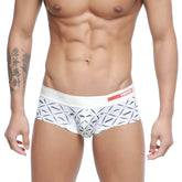 White briefs with black geometric mustache pattern and red arrow logo on waistband from metromalewear micro mini boxer caballero 7013-04