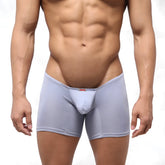 Light gray form-fitting men’s boxer briefs with textured fabric and a red MetroMaleWear tag at the waistband