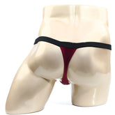 A sleek deep red MetroMaleWear Modernizing thong with contrasting black elastic waistband for modern comfort