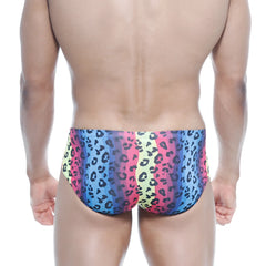 Vibrant rainbow-striped MetroMaleWear mojito bikini swim trunks with bold black leopard print on stretchy fabric