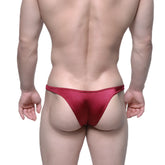 A shimmering red metallic MetroMaleWear Monaco bikini thong with a sleek form-fitting design in burgundy