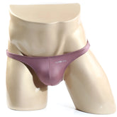 Purple satin-like thong with subtle mew logo on front from metromalewear monaco bikini lilac 6010-03 collection
