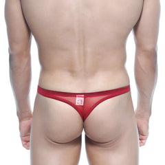 Red mesh thong back view with a small rectangular label by metromalewear in bright red net fabric