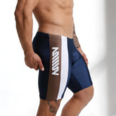 Navy blue and brown MetroMaleWear New Jammer swim boxer with white vertical stripe and bold m logo