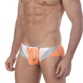 MetroMaleWear Olympian swim brief in orange with white and silver stripes and drawstring closure for swimming