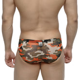 Metro male wear orange camo hip brief 5103-80 with orange green and beige camouflage pattern made of stretchy fabric