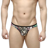 MetroMaleWear Over-Limit bikini orange men’s brief with vibrant pink green and black tiger stripe pattern on beige base