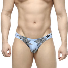 Light blue metro malewear palma bikini briefs with black leaf pattern and small logo on waistband for men