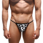 MetroMaleWear Perfect Scene string thong in black and white cow print with thin black elastic waistband front view