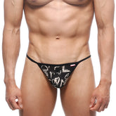 Black thong with white graffiti lettering and red metro male wear tag on waistband perfect scene string oraculo 2014-78