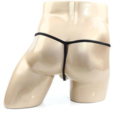 Black thong with pearl detail displayed on a mannequin back from MetroMaleWear Perfect Scene String Pearl 2014-22