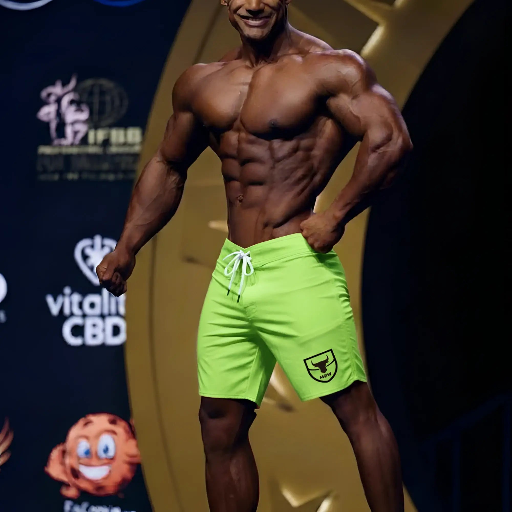 Metro male wear physique board short neon green with white drawstring and black shield logo on lower right leg