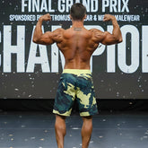 MetroMaleWear physique board short in yellow camo with a yellow waistband featuring a camouflage pattern