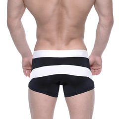 Black and white striped men’s briefs with wide elastic waistband made of polyester from MetroMaleWear short boxer arc