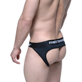 Black MetroMaleWear Pops bikini jock strap thong with white logo on waistband showing the back side of the product