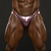 Shiny rose gold metallic thong from MetroMaleWear posingwear cherry pink posing suit front view