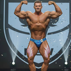 MetroMaleWear posingwear hologram royal blue competition briefs with pink flame decals and white number 38 badge