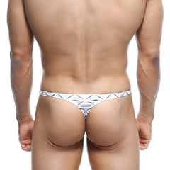 White thong with black geometric pattern and small metallic logo at center from metromalewear pouch thong caballero 2302-03