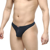 Navymalewear pouch thong in navy blue sheer mesh with a red and white brand tag on the waistband