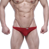 Red striped metroMaleWear pouch thong with snug fit and small white brand tag on waistband in red stripe design