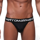 Black metromalewear prieto thong briefs with a white logo band designed for comfortable everyday wear