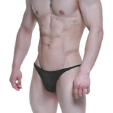 Black form-fitting swim trunks metroMalewear prodigy bikini 6504-20 with smooth stretchy fabric and minimalistic design