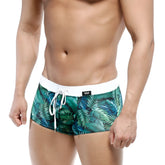 MetroMaleWear Profundo swim boxer briefs with green tropical leaf pattern and white waistband with drawstring