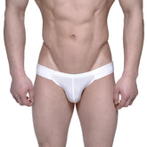 White form-fitting seamless men’s briefs with subtle branding on the waistband MetroMaleWear Puente Bikini Crystal 3603-03