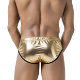 Shiny gold metallic briefs with black trim from metromalewear puente bikini metalic gold 3603-m21