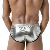 Shiny silver metallic briefs with black trim by metromalewear puente bikini metalic silver 3603-m10 front view