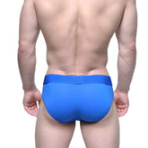 Bright blue royal blue form-fitting metro male wear pull down hip brief with smooth elastic waistband