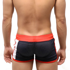 MetroMaleWear Punch Short navy 4709-28 black and red mesh athletic shorts with white side stripes and orange waistband