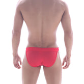 Bright red form-fitting swim bikini by MetroMaleWear with smooth fabric and contoured design for swimming use