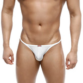 White form-fitting thong bikini with subtle red logo tag at waistband from metromalewear romantic bikini 6008-00