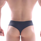 Black form-fitting thong underwear with smooth stretchy fabric waistband from metromalewear snap thong black 2212-20