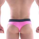 Bright pink MetroMaleWear snap thong with a contrasting black waistband designed for comfortable male wear