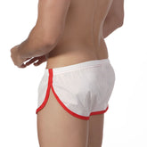 MetroMaleWear soccer split shorts in white mesh with red trim and elastic waistband for athletic use