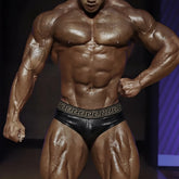 Black leather MetroMaleWear special edition anaconda swim brief with gold Greek key pattern waistband