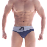 Navy blue and light gray MetroMaleWear STEEL swim brief with black drawstring waistband for swimming